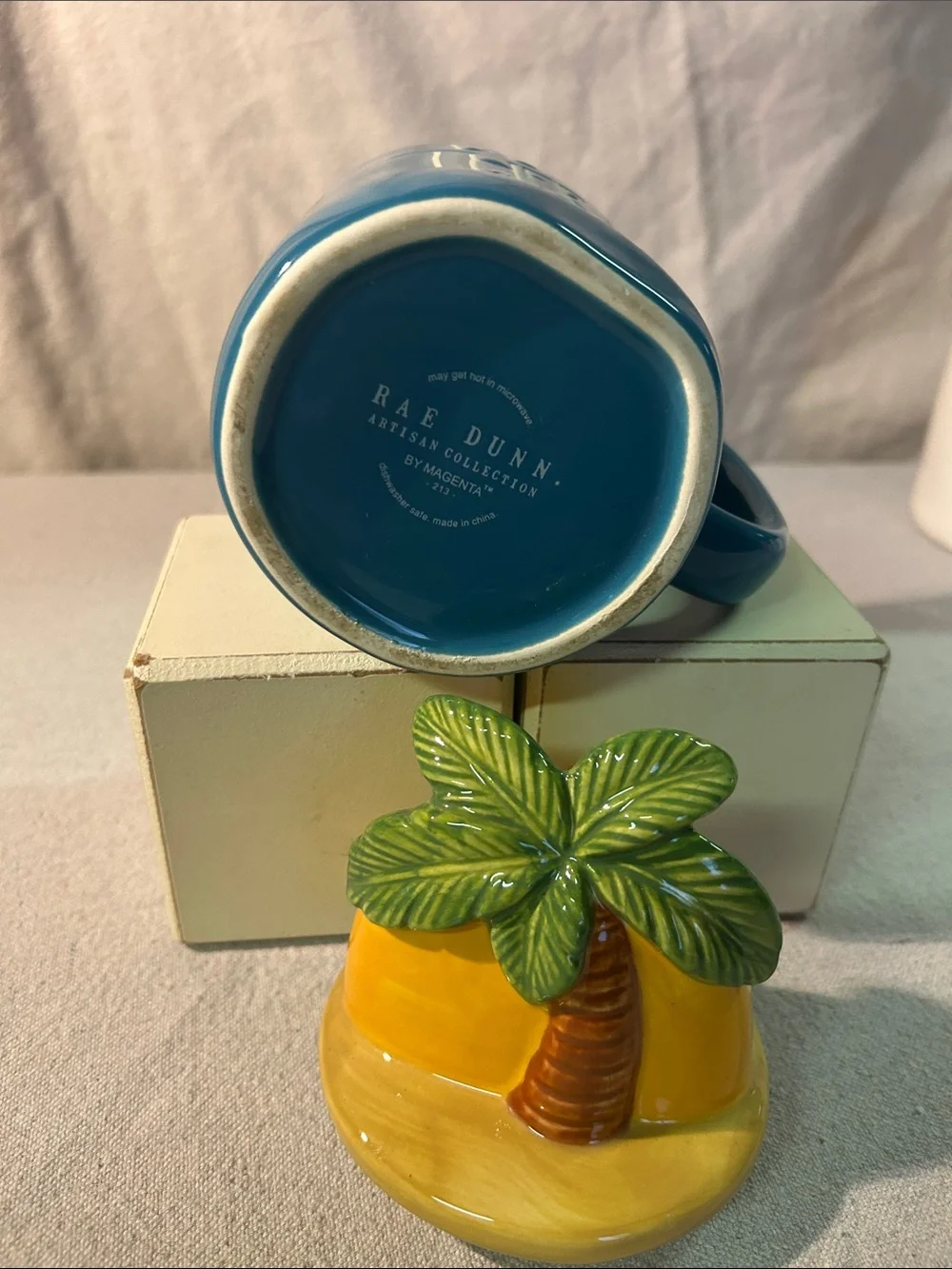 Rae Dunn Blue Ceramic Mug with Yellow Palm-Top Lid